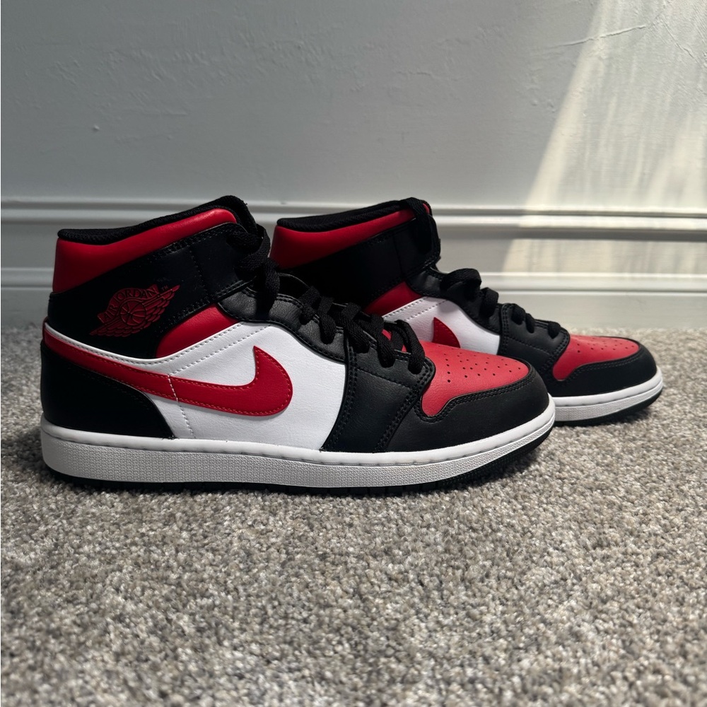 Jordon 1’s  Black, Red, and White Mid-Tops